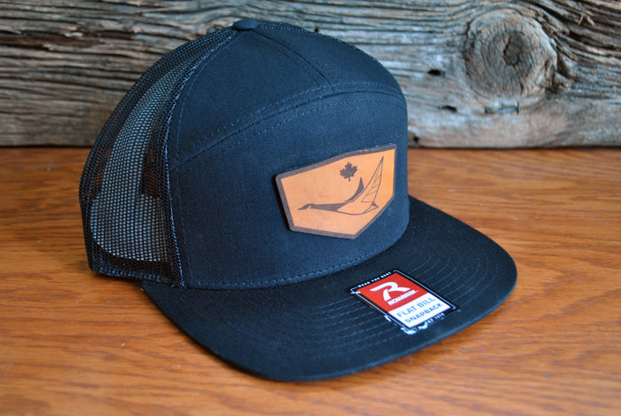 7 panel flat bill snapback with leather patch